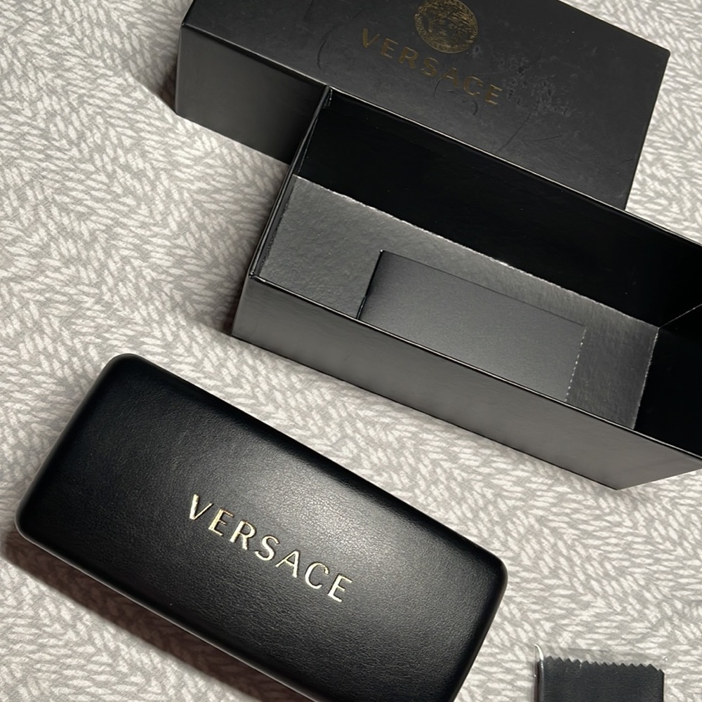 Black polarized VERSACE shades. Brand new, never worn.